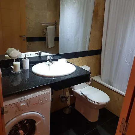 Oasis La Caleta Адехе